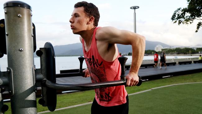 Nathan Kent from Cairns CBD working out on the Esplanade. PICTURE: STEWART McLEAN