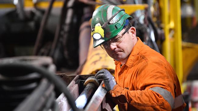 A BHP employee at work at the Olympic Dam mine site in Roxby Downs. Picture: AAP / David Mariuz