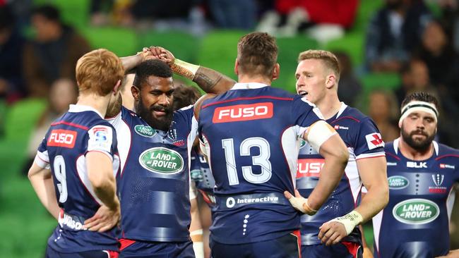Marika Koroibete and the Rebels look dejected after conceding a try.