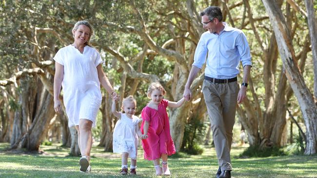 The family man, with wife Helen and two of their daughters, Beatrice and Harriet, wants the focus to be on middle Australia. Picture: David Swift