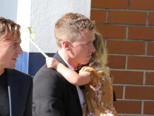 PERTH, AUSTRALIA - NewsWIRE Photos January 17th  2024: Rohan Dennis with daughter, and son behind, leaving Memorial Service to celebrate the life of his late wife Olympic cyclist Melissa Marie Dennis, at Fremantle Cemetery. Picture: NCA NewsWIRE/Philip Gostelow