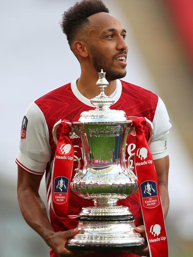 Arsenal’s Pierre-Emerick Aubameyang holds the spoils of victory. Picture: AFP