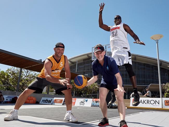 Darwin Mad Ballers 3x3 organisers Emanuel Siriotis and Deola D’Brown, with Helping People Achieve’s Tony Burns (centre) in 2019. Picture: SUPPLIED