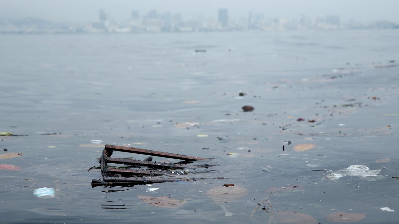 RIO DE JANEIRO, BRAZIL - JULY 29: Pollution floats in Guanabara Bay, site of sailing events for the Rio 2016 Olympic Games, on July 29, 2015 in Rio de Janeiro, Brazil. The Rio government promised to clean 80 percent of pollution and waste from the bay in time for the games but admits that goal now is unlikely to be reached. August 5 marks the one-year mark to the start of the Rio 2016 Olympic Games. (Photo by Matthew Stockman/Getty Images)