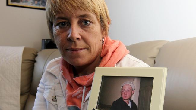 Lillian Watkins holds a picture of her missing son Christopher. Picture: Ross Marsden