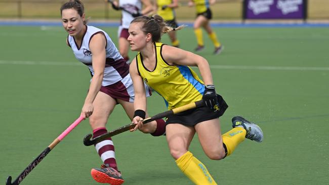 Leah Welstead (yellow) in action against Grange last season. Picture: Keryn Stevens