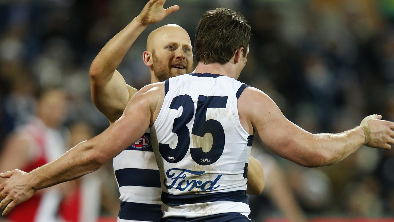 Patrick Dangerfield and Gary Ablett celebrate a goal on Saturday night.
