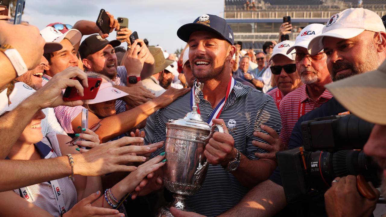 Bryson DeChambeau of the United States celebrates with fans after winning the 124th U.S. Open at Pinehurst Resort. Photo by Gregory Shamus/Getty Images