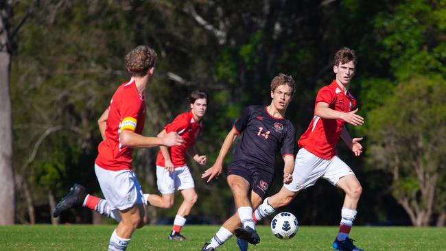 Gregory Terrace and Ipswich Grammar School First XI football action.