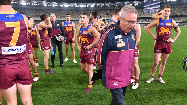 Lions coach Chris Fagan and his players after the semi-final loss to GWS.