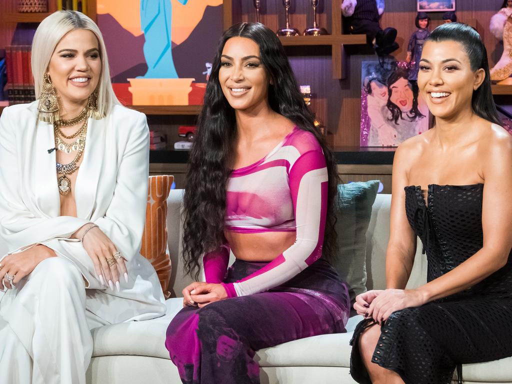 Khloe Kardashian with her sisters Kim and Kourtney Kardashian on the set of Watch What Happens Live. Picture: Getty Images