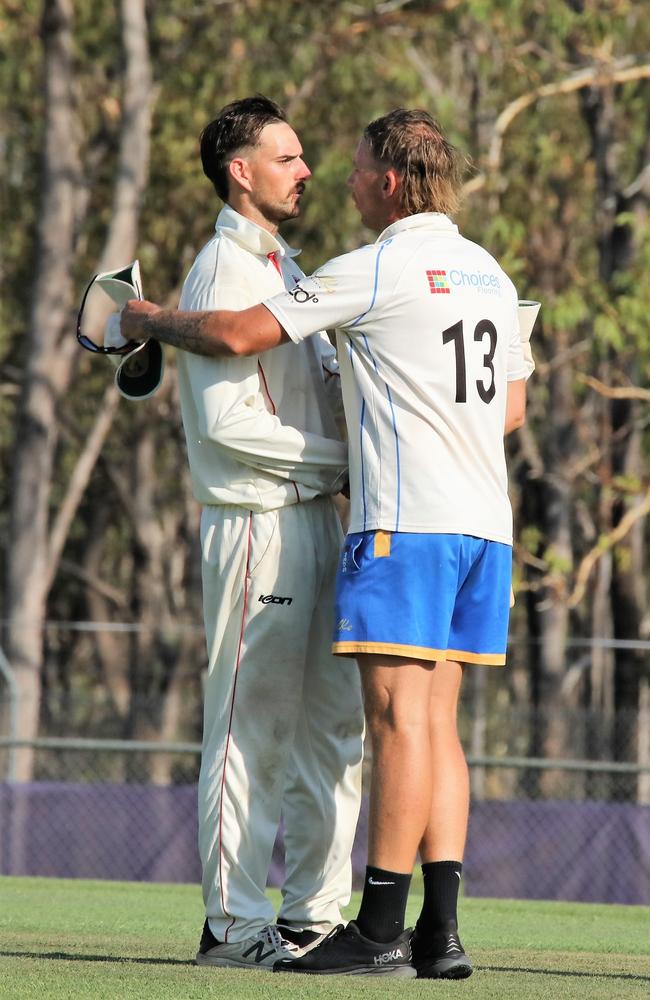 Matt Hammond shakes hands with Darwin captain/coach Jake Reed after the 2022 Premier grand final. Picture: Darwin &amp; District CC.