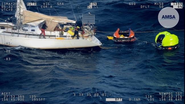 An AMSA operated Cairns-based Challenger aircraft has helped rescue three people on a sinking 17m sailing boat in the Coral Sea. Picture: AMSA