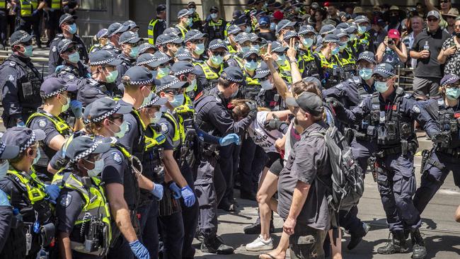 Freedom Day protesters clash with police on Melbourne Cup Day. Picture: Jake Nowakowski