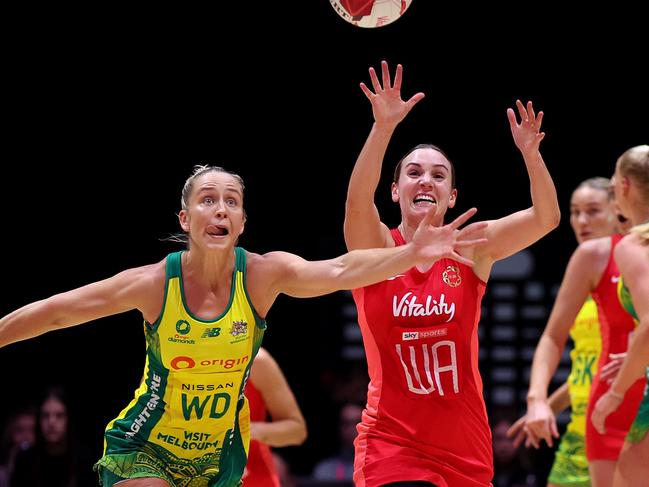 Nat Metcalf and Jamie-Lee Price battle for the ball. Picture: George Wood/Getty Images