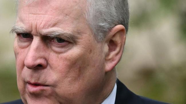 Britain's Prince Andrew, Duke of York reacts as he leaves St. George's Chapel, in Windsor Castle, after attending the Easter Mattins Service, on March 31, 2024. (Photo by JUSTIN TALLIS / AFP)