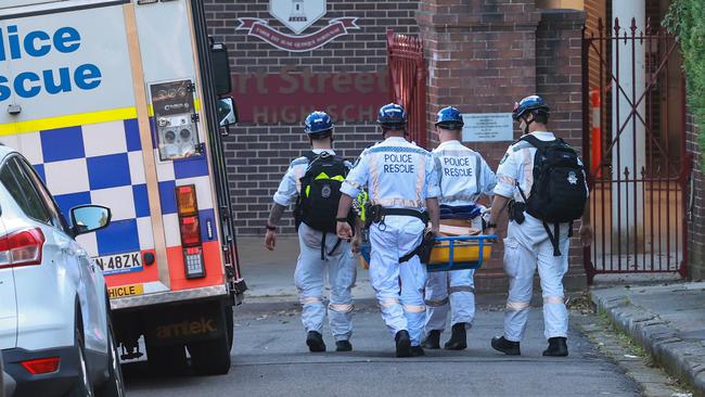 Police Rescue tend to the incident at Fort Street High School where a stonemason was killed by building debris. Picture: Jason Lloyd