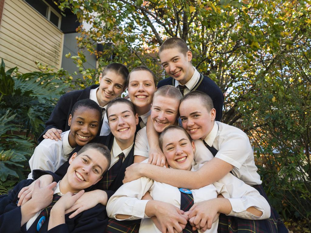 The Fairholme College Year 12 cohort has raised nearly $70,000 with their Shave for a Cure 2023 campaign students who shaved were (back, from left) Lara Palmer, Maeve Toombes, Lilly Biernoff, (middle row, from left) Ruva Maphosa, Amelia O'Dea, Abigail Crocker, Bridie Worland, Isabelle Watts (front, left) and Bianca Wilson (absent is Maddie Seawright). Picture: Kevin Farmer