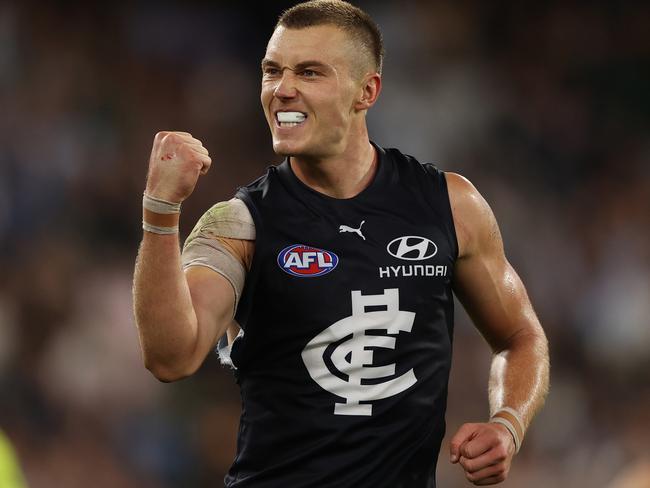 MELBOURNE, AUSTRALIA - MARCH 17: Patrick Cripps of the Blues celebrates after scoring a goal during the round one AFL match between the Richmond Tigers and the Carlton Blues at Melbourne Cricket Ground on March 17, 2022 in Melbourne, Australia. (Photo by Robert Cianflone/Getty Images via AFL Photos)