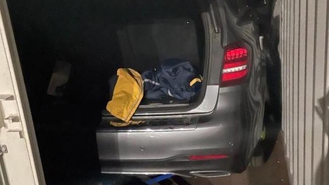 The car inside the truck shipping container where Mostafa Baluch allegedly hid. Picture: NSW Police