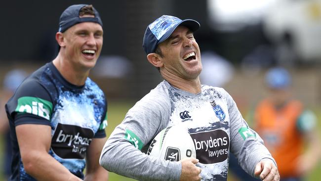 Coach Brad Fittler and centre Jack Wighton share a joke at training. Picture: Phil Hillyard