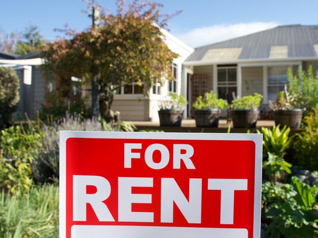 A For Rent Sign Outside a House.