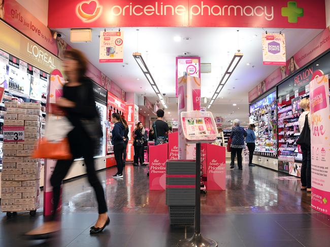 A shopper leaves a Priceline Pharmacy store in Sydney on Thursday, April 20, 2017. Australian Pharmaceutical Industries expects to boost its Priceline Pharmacy network by at least 20 stores during the current financial year and to lift its full-year net profit by at least 10 per cent. (AAP Image/Paul Miller) NO ARCHIVING