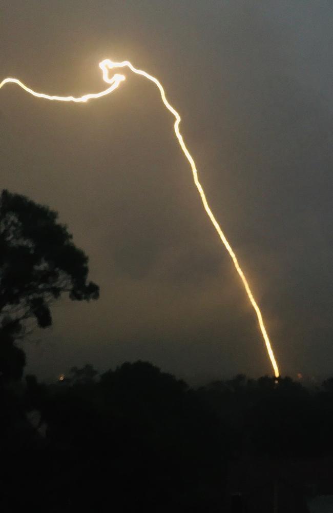 An electrical storm has hit Sydney on Wednesday night and flights from Sydney Airport have been suspended after an incoming flight was reportedly hit by lightning.