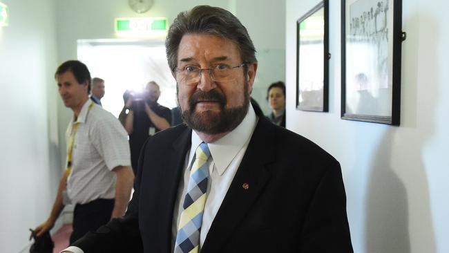 Justice Party Senator Derryn Hinch leaves after a press conference at Parliament House in Canberra yesterday. (AAP Image/Mick Tsikas)