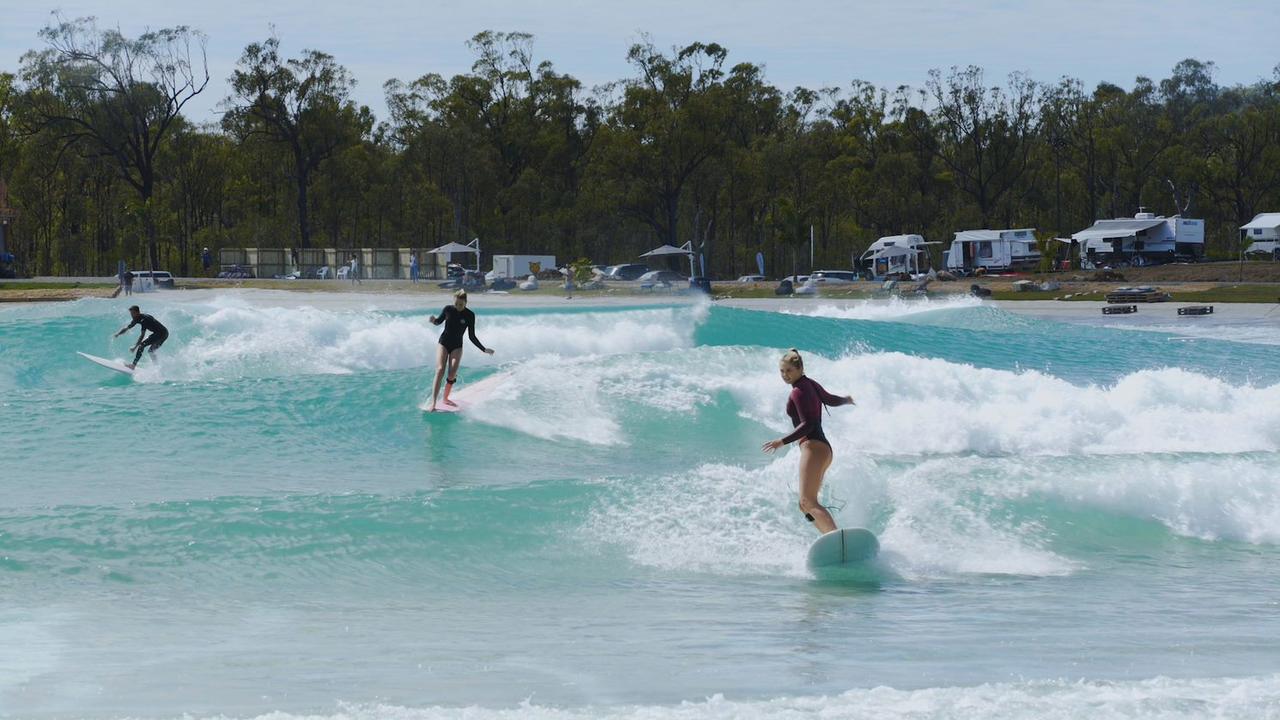 Longboarders front to back - Charlotte Lethbridge, Surf Lakes Ambassador, and Australia Junior Women's Longboard Champion, Luca Doble, Aaron Hughes.