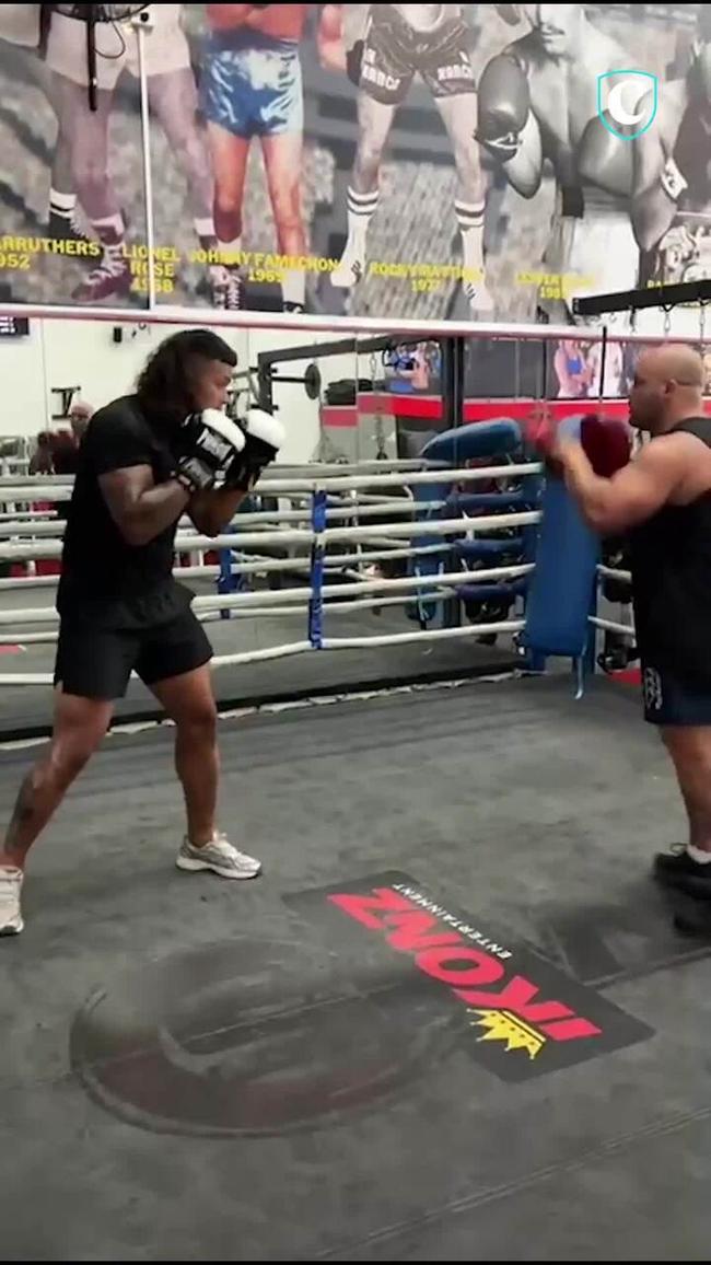 Broncos giant shows off his boxing skills