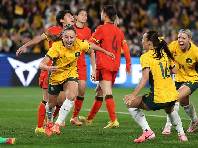 SYDNEY, AUSTRALIA - JUNE 03: Clare Wheeler of Australia celebrates scoring a goal during the international friendly match between Australia Matildas and China PR at Accor Stadium on June 03, 2024 in Sydney, Australia. (Photo by Mark Metcalfe/Getty Images)