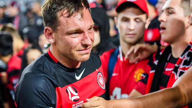 A tearful Brendon Santalab after the derby. (AAP Image/Brendan Esposito)