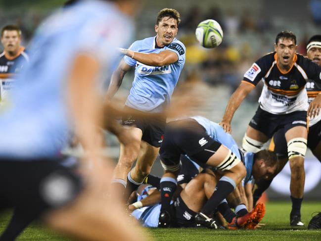 Jake Gordon of the Waratahs passes the ball during the Round 7 Super Rugby match between the Brumbies and the NSW Waratahs at GIO Stadium in Canberra, Saturday, March 31, 2018. (AAP Image/Rohan Thomson) NO ARCHIVING, EDITORIAL USE ONLY