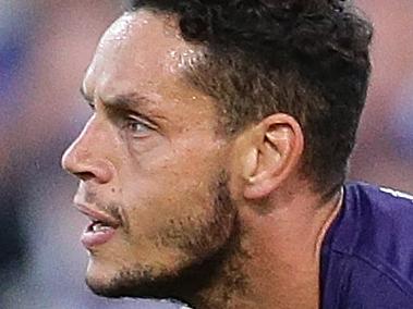 PERTH, WESTERN AUSTRALIA - APRIL 08:  Michael Johnson of the Dockers handballs during the round three AFL match between the Fremantle Dockers and the Western Bulldogs at Domain Stadium on April 8, 2017 in Perth, Australia.  (Photo by Will Russell/AFL Media/Getty Images)