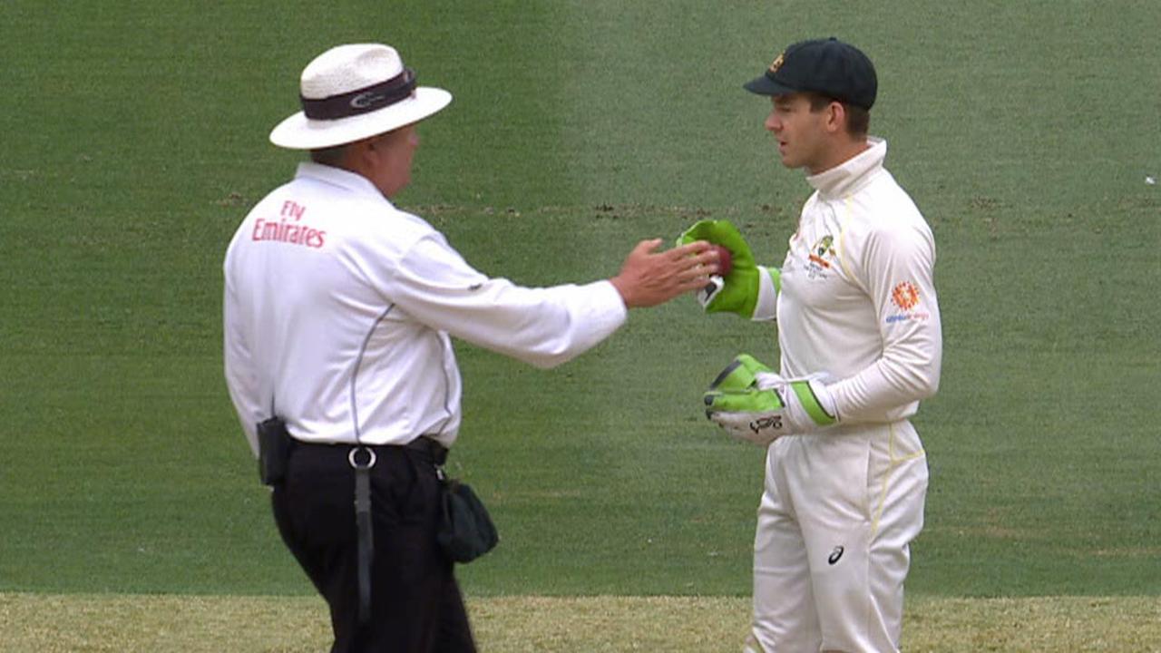 Tim Paine is pinged for negative play by the umpire.