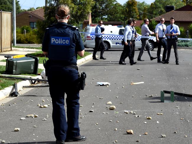 Rocks remained on the street this morning. Picture: Nicole Garmston