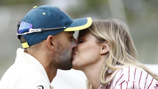 Nathan Lyon of Australia celebrates victory with a kiss from partner Emma McCarthy Picture: Ryan Pierse/Getty Images