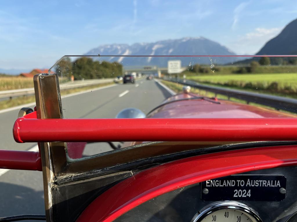 The majestic snow-capped peaks of Austria beckon as Benns and Brown putter through the countryside in their 100-year-old vehicle.