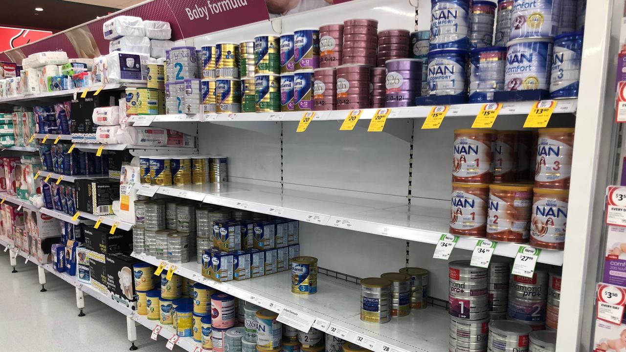 A depleted shelf at a supermarket in Sydney after popular baby formula tins were snapped up.