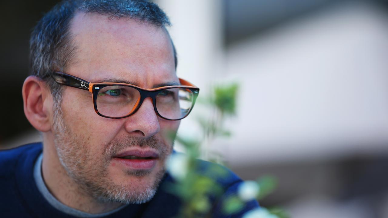 Former F1 World Champion Jacques Villeneuve arrives in the paddock before practice for the Australian Formula 1 Grand Prix at Albert Park. Photo by Robert Cianflone/Getty Images