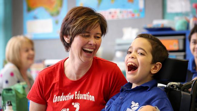 Kati Balla with student Duncan at the Kidman Park Primary School. Picture: Matt Turner