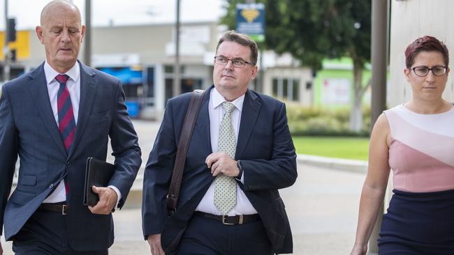 Ex-Logan mayor Luke Smith (centre) arrives at Beenleigh Magistrates Court on Friday, January 24, 2020. A former Queensland mayor accused of perjury and official corruption will face a second day of his committal hearing. (AAP Image/Glenn Hunt)