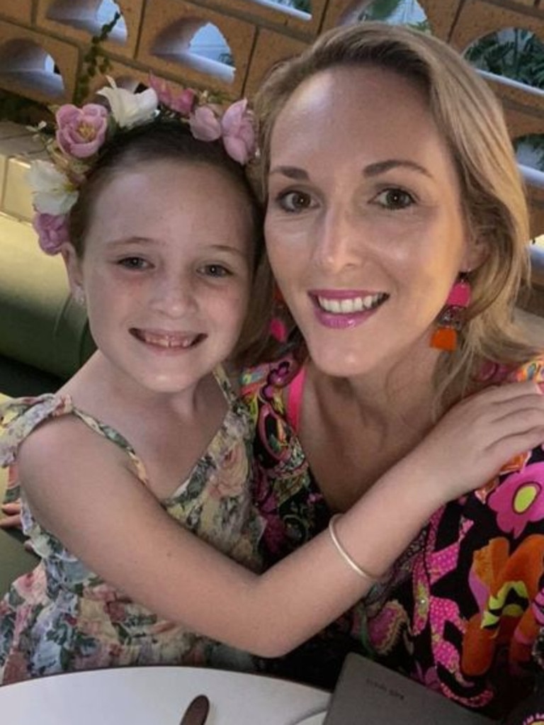 Lilli Jones, 8, and her mother Krystina are on the hunt for a silver bangle with floated away with a helium balloon at the Toowoomba Show.