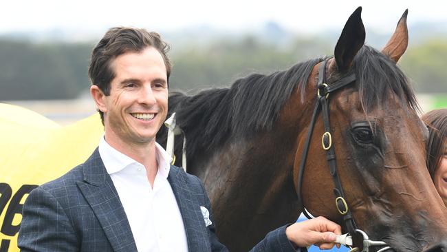 Trainer Michael Kent Jnr (left) celebrates a win at Ballarat on December 7. Picture: Brett Holburt/Racing Photos via Getty Images