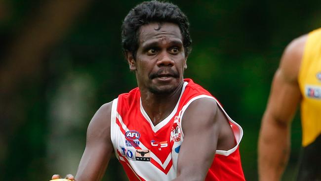 Timmy Mosquito looks for a teammate in the Men's Premier League game against Nightcliff. Picture: GLENN CAMPBELL