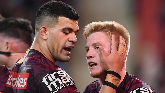 BRISBANE, AUSTRALIA - AUGUST 21: Tom Dearden of the Broncos celebrates with teammates after scoring a try during the round 15 NRL match between the Brisbane Broncos and the St George Illawarra Dragons at Suncorp Stadium on August 21, 2020 in Brisbane, Australia. (Photo by Matt Roberts/Getty Images)