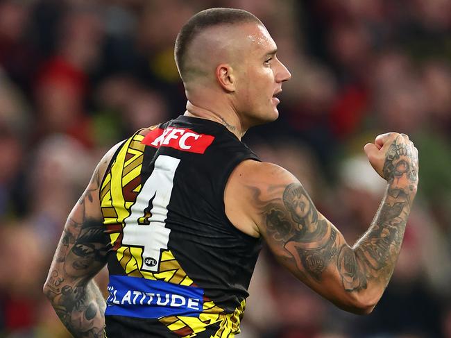 MELBOURNE, AUSTRALIA - MAY 25: Dustin Martin of the Tigers celebrates kicking a goal during the round 11 AFL match between Richmond Tigers and Essendon Bombers at Melbourne Cricket Ground, on May 25, 2024, in Melbourne, Australia. (Photo by Quinn Rooney/Getty Images)