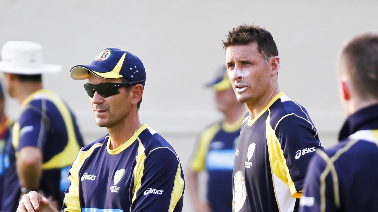 Australian cricket team members Justin Langer and Mike Hussey attend a practice session at the Sharjah Cricket Stadium in Sharjah, United Arab Emirates, Thursday, Aug. 23, 2012. Australia plays Afghanistan in Sharjah on Saturday, Aug. 25, 2012. (AP Photo/Charles Verghese)