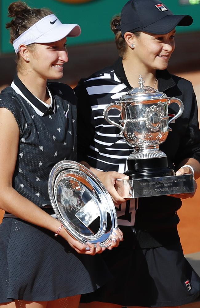 Australia's Ashleigh Barty, right, and Marketa Vondrousova of the Czech Republic pose with their trophy after the women's final match of the French Open. Picture: AP Photo